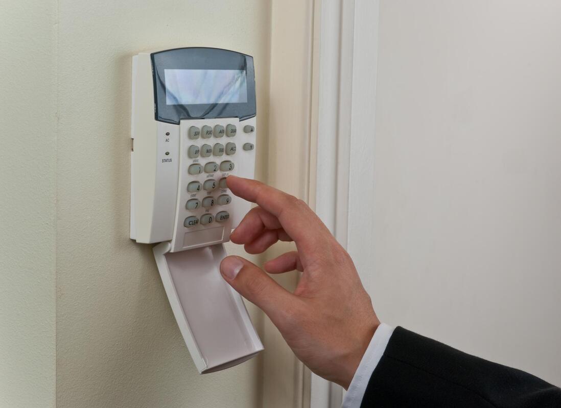 homeowner enters passcode on door
